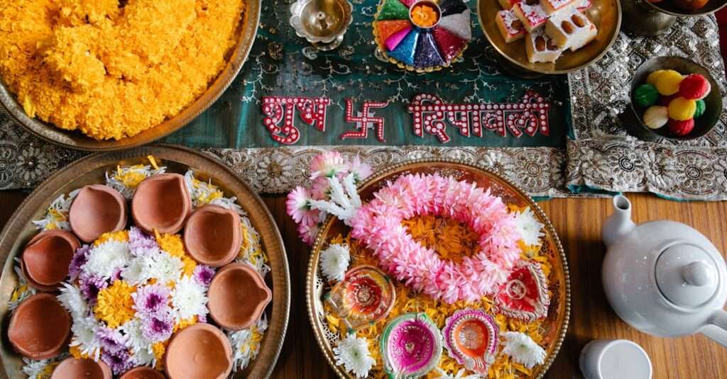 Vibrant Diwali table arrangement showcasing traditional sweets and decor items.